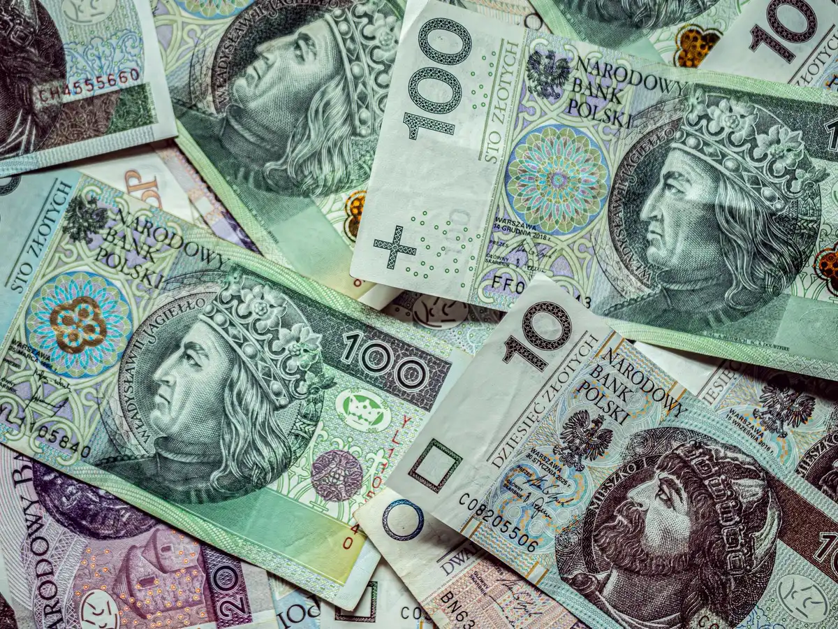 Grafico con curve di tassi d'interesse e simboli di banche centrali
